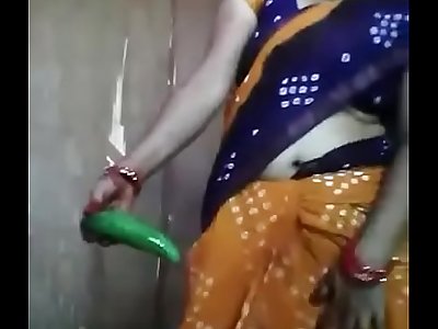 Desi Aunty Toying with cucumber