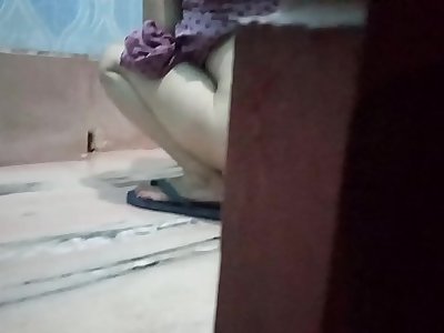 desi bhabi urinating and naughty son using his mobile fastly to take the video hiddenly